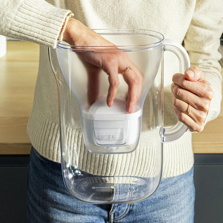Inserting MAXTRA water filter cartridge in BRITA water filter jug Style Essential.